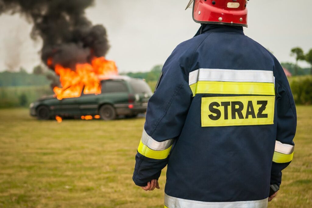 Fireman Watching Flaming Vehicle